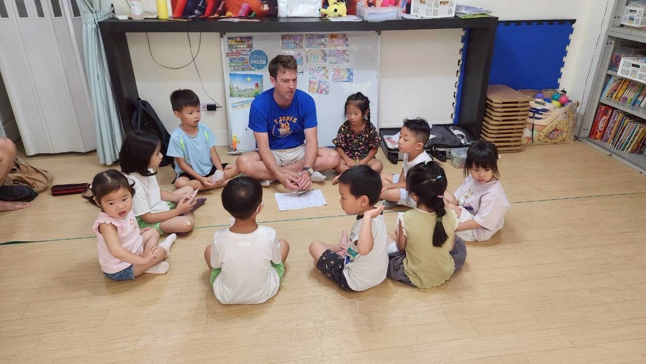 Children learning English in class