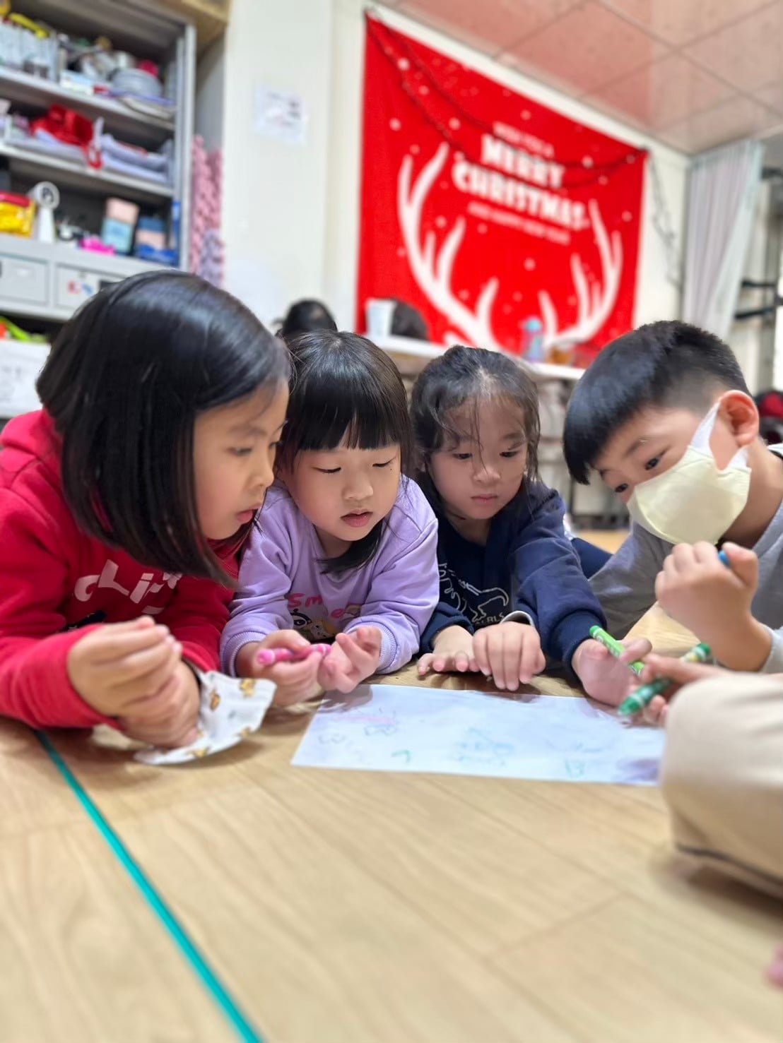 Children enjoying an English class activity